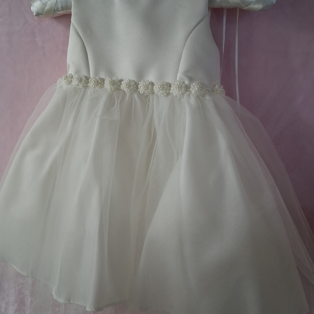 Elegant White Dress with Floral Accents